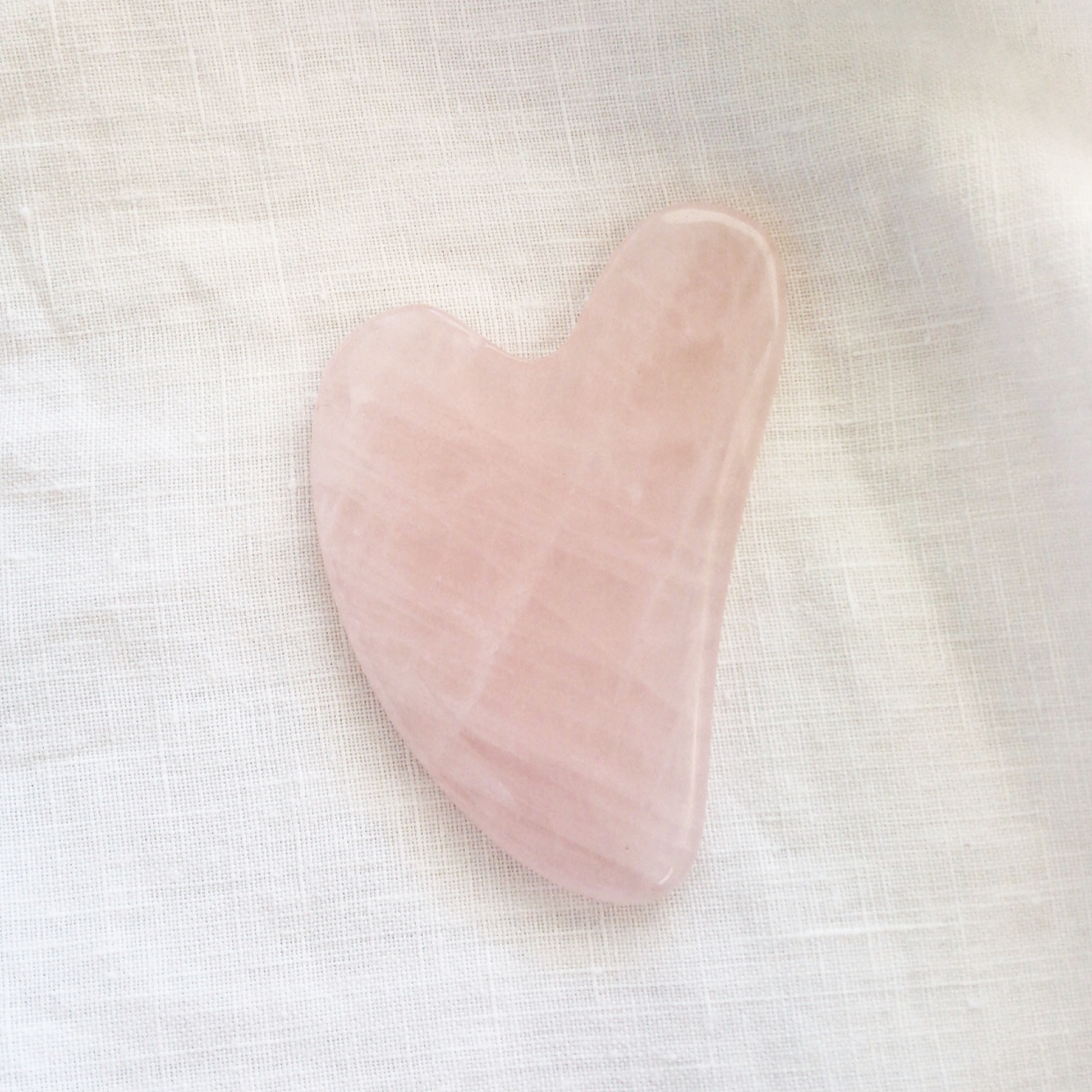 gua-sha-facial-stone-tool-rose-quartz